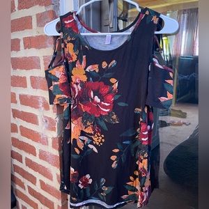 large floral tee with exposed shoulders